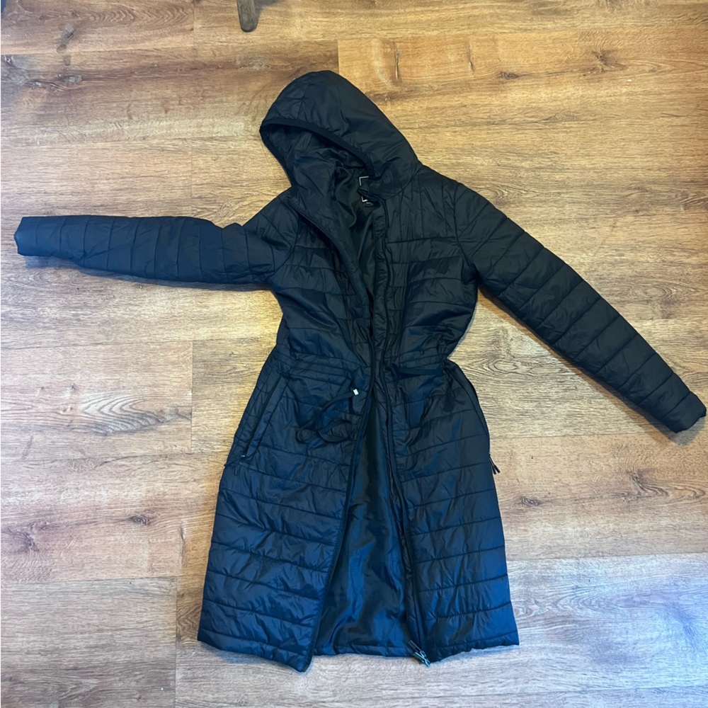 Woman’s long waist puffer winter coat. Cinched waist.kyodan outdoor